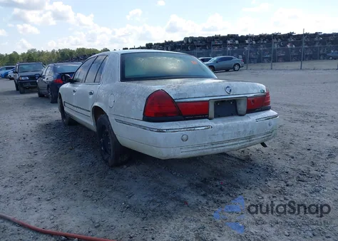 1999 Mercury Grand Marquis Gs z USA, uszkodzony, nr VIN 2MEFM74W7XX734151